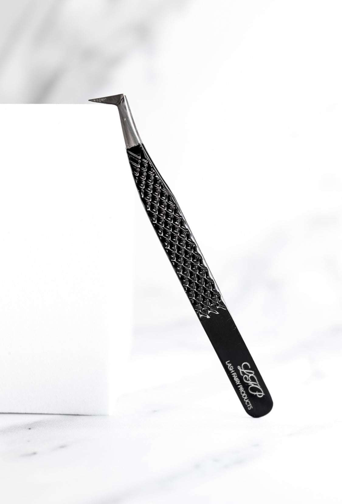 L shaped tweezer